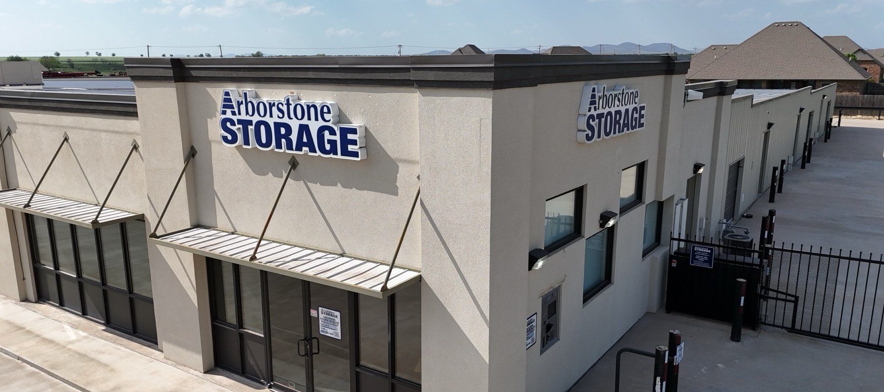 An Arborstone Storage facility office with gated drive-up access